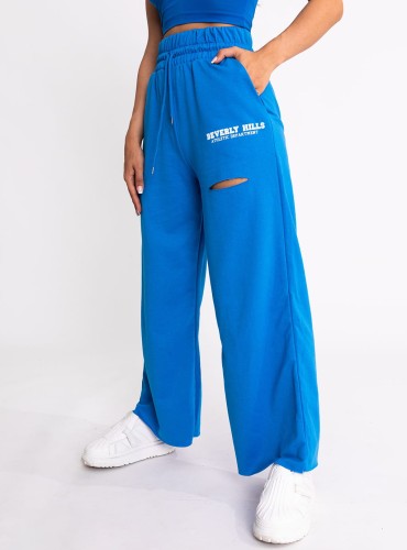 Lolli- spodnie z szeroką nogawką, ozdobnym nadrukiem i rozcięciem- niebieskie